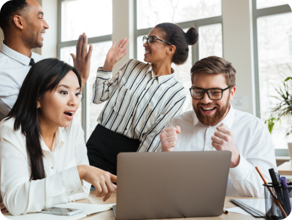 Young business people cheering