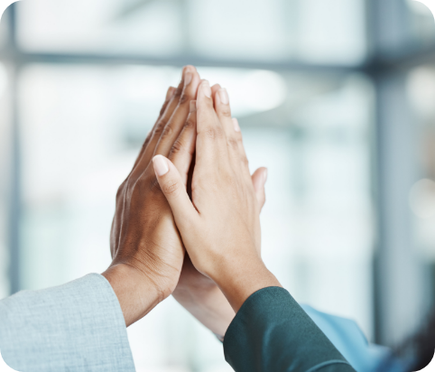 Three people giving high five