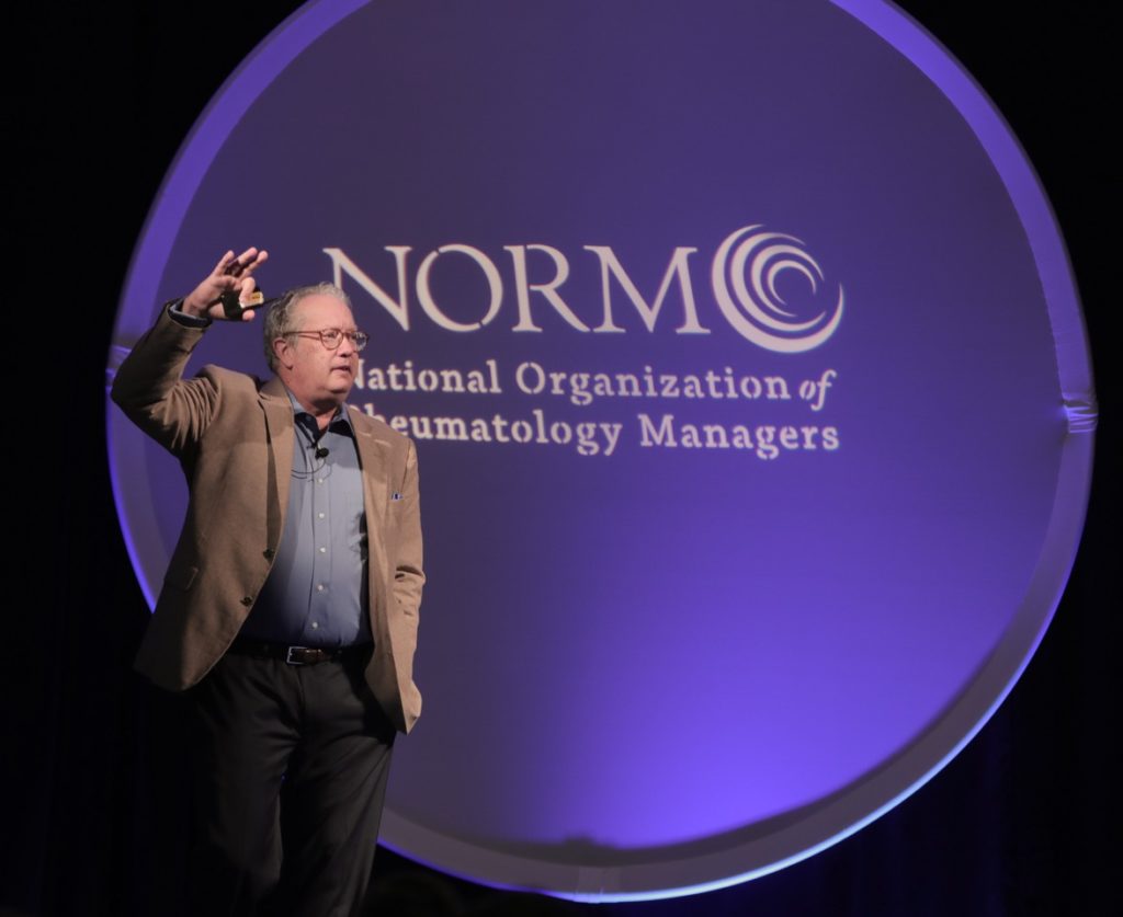 Paul White speaking at Norm